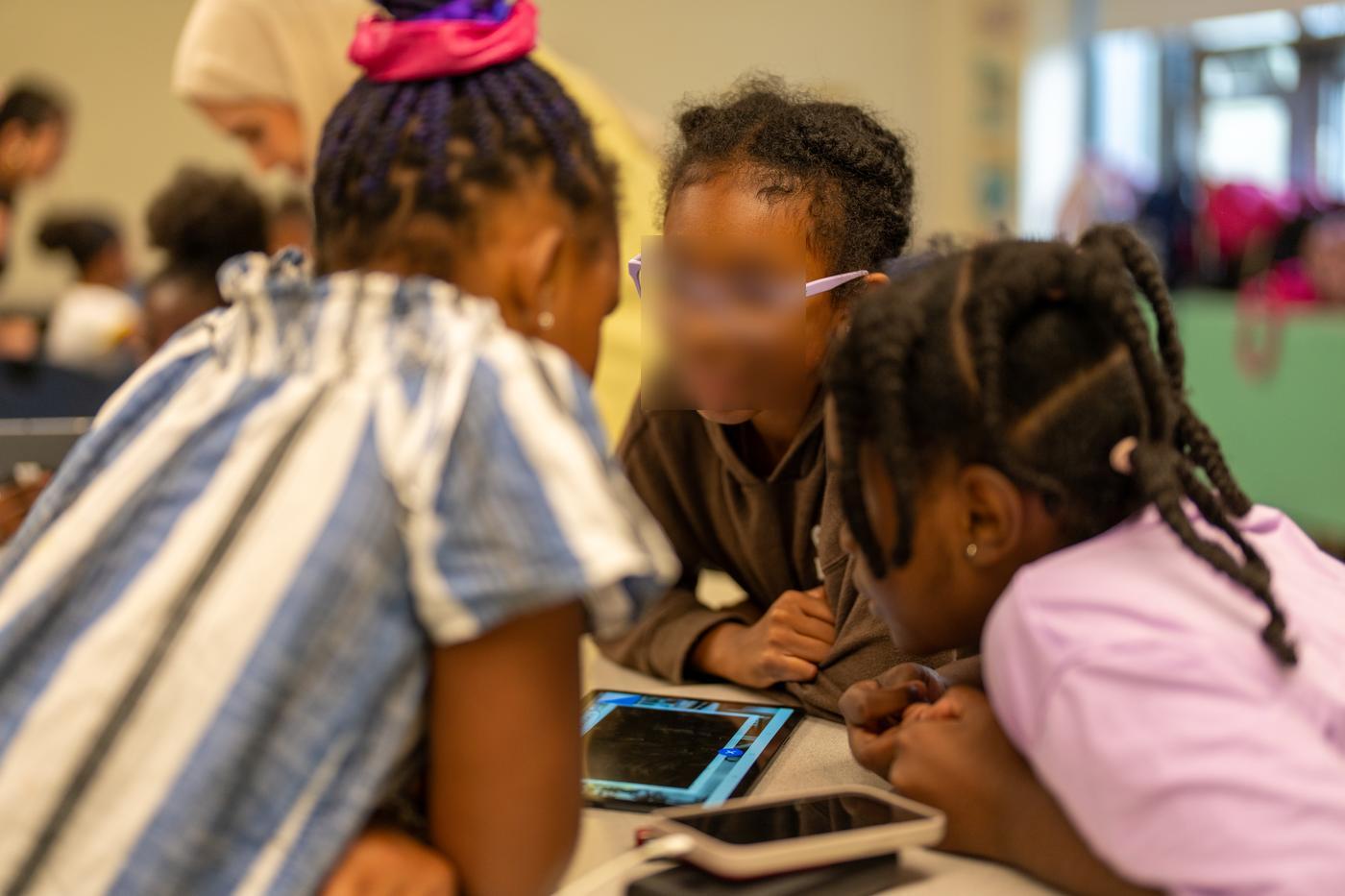 Children engaged with AI learning
